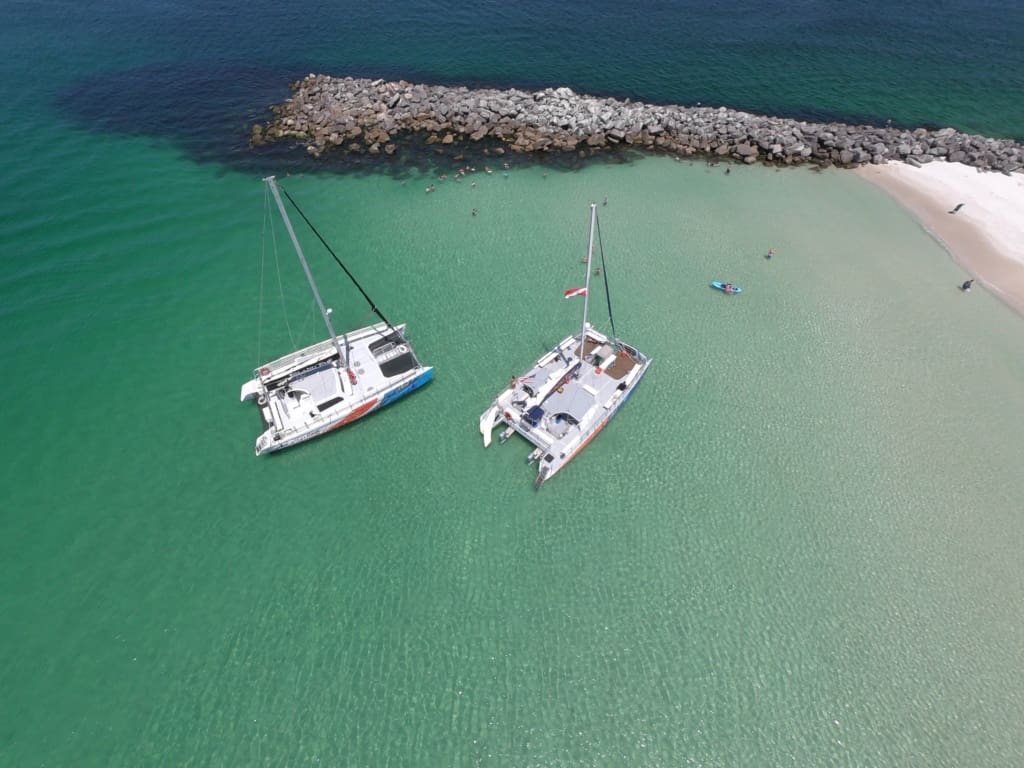 An overhead view of the new Island Time II and Island Time sailing catamarans at Island Times Sailing.