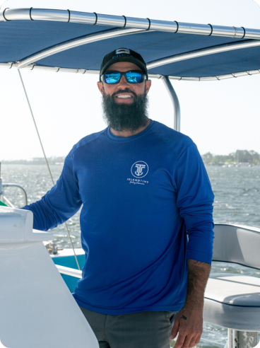 a man standing on a boat