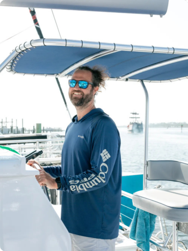 a man standing on a boat