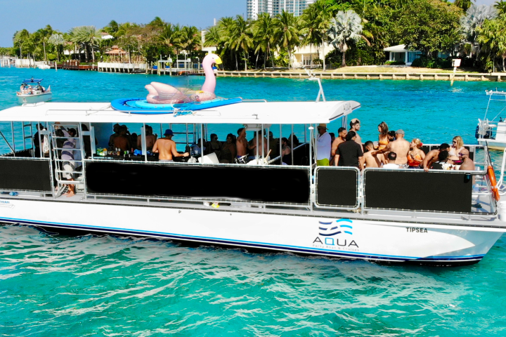 a group of people on a boat in the water
