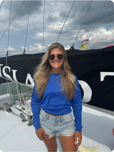 a woman standing on a boat